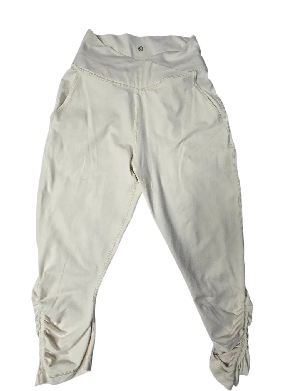 lululemon Athletica Sunset Salutation Crop leggings in a light beige or cream